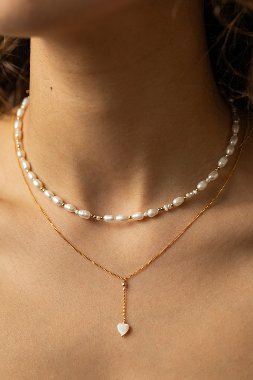 Long necklace - three mother of pearl hearts
