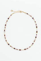 Collier Vénus à plat, perles de culture, grenat rouge et rhodochrosite enfilés à la main