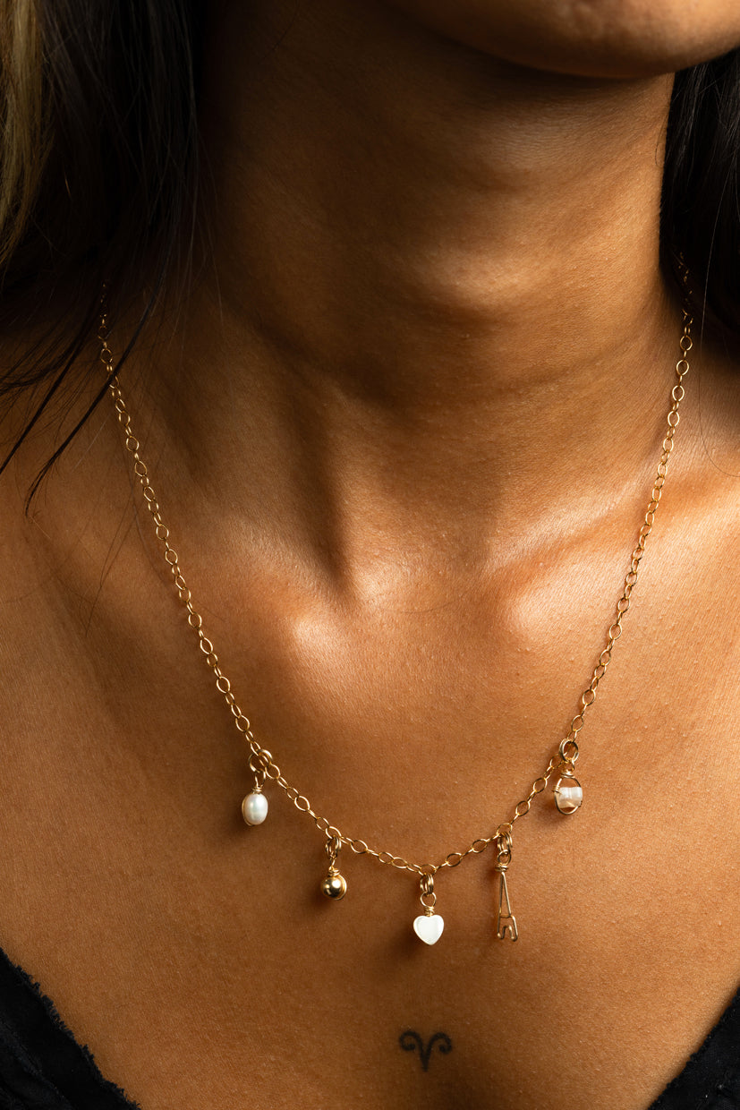 Mother-of-pearl heart charm pendant