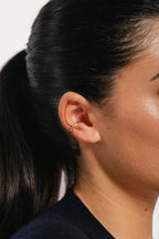 Faux piercing Théa or porté à l'oreille, sans perçage