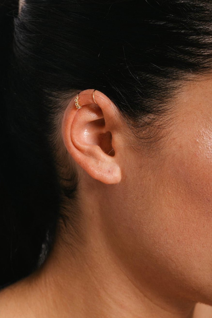 Faux piercing double hélix tissé