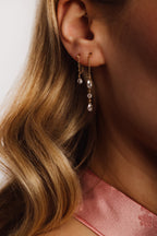 Détail de la boucle d'oreille Riviera, 0,36 carat de diamants percés sur or 18 carats