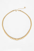 Collier Lana à plat, enfilage de perles d'or lisses de 4 et 5 mm