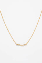 Collier court Théa à plat, enfilage de perles dorées de 2 mm