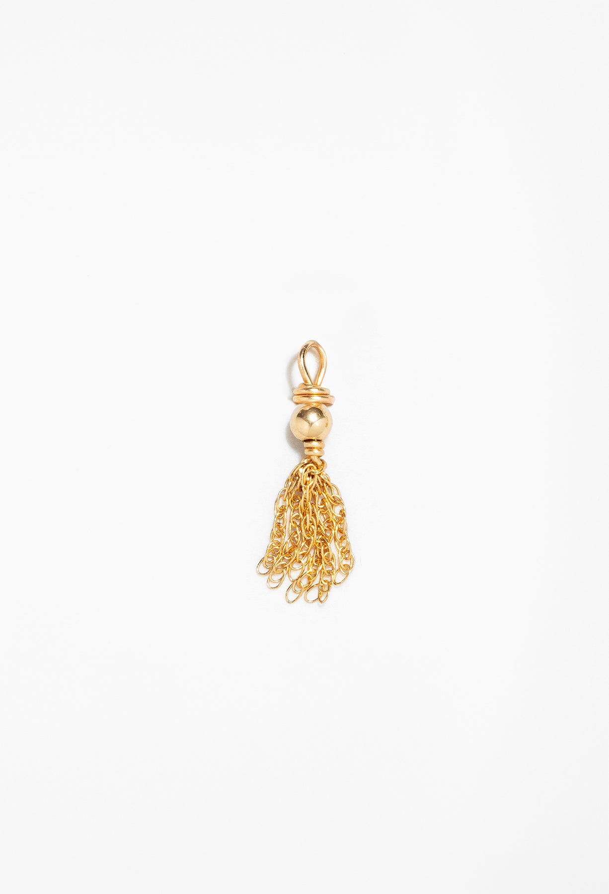 Gold pompom charm pendant