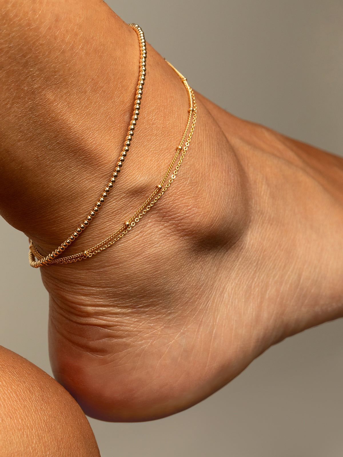 Queen ankle chain