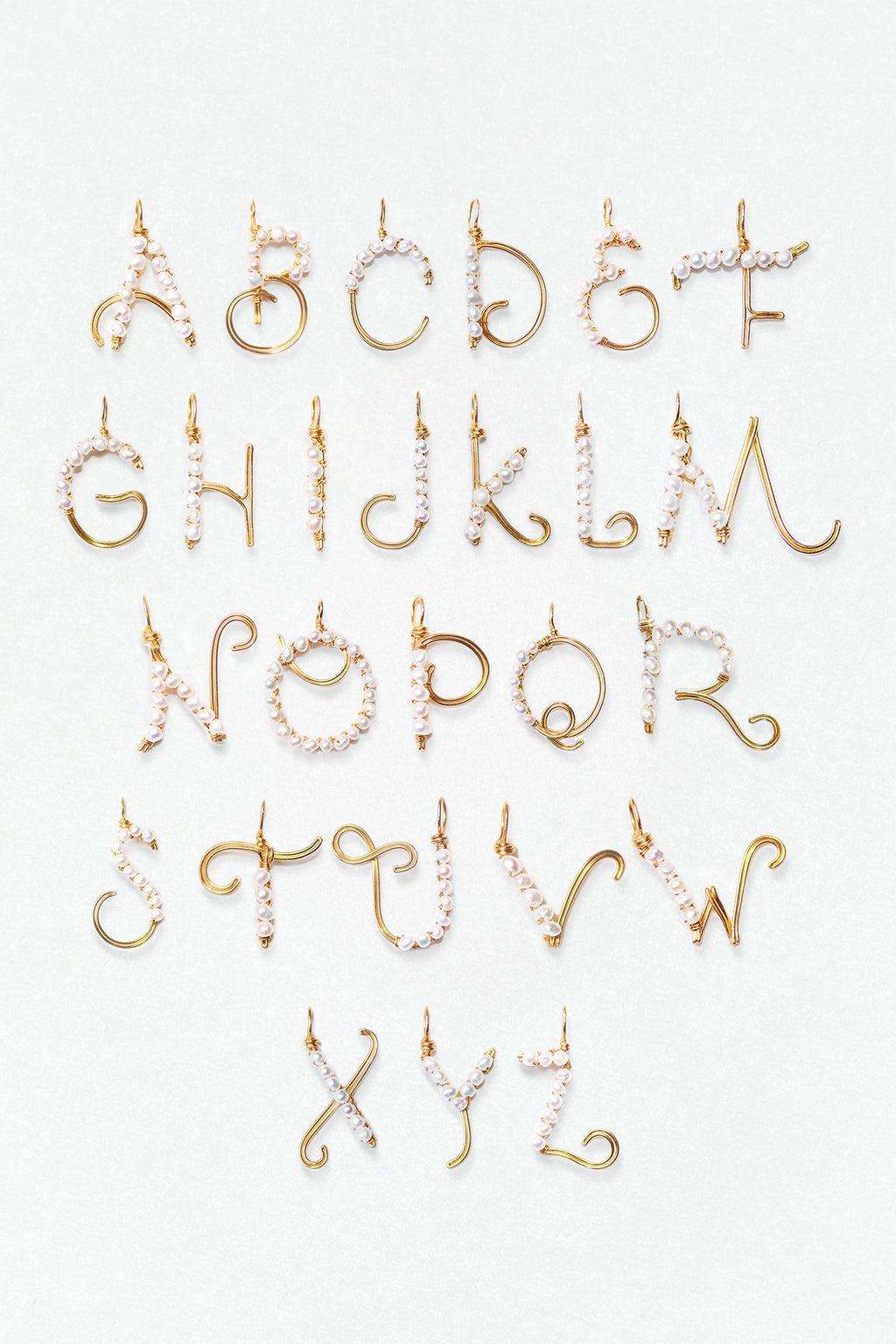Woven letter - Cultured pearl